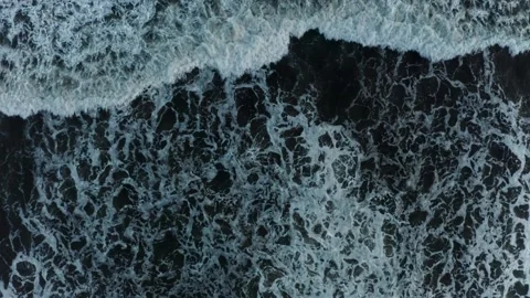 Waves and foam in the ocean view from above, dark water Stock Footage 229778024