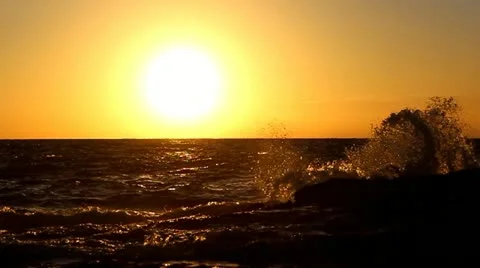 Waves and golden sun Video stock 20585962