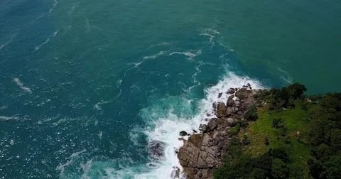 The waves and the island Stock Footage 78574404