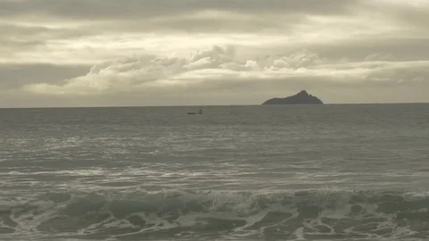 Waves And Kayak at The Beach Video stock 79070404