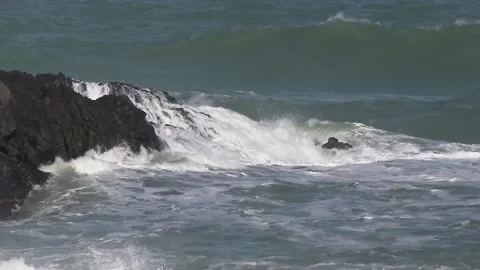Waves and little rock Stock Footage 147490292
