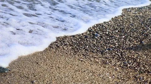 Waves and Pebble Beach and Sea. Waves Rolled Along the Shore. Stock Footage 244809903