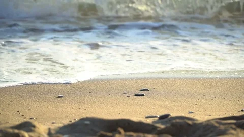 Waves and pebbles Stock Footage 77654556