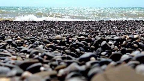 Waves and pebbles Stock Footage