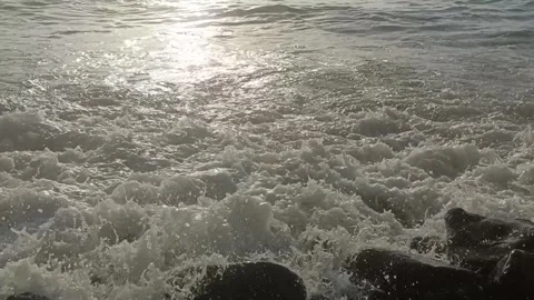 Waves And Rocks And Surf At Ocean Beach Video Video stock 276705653