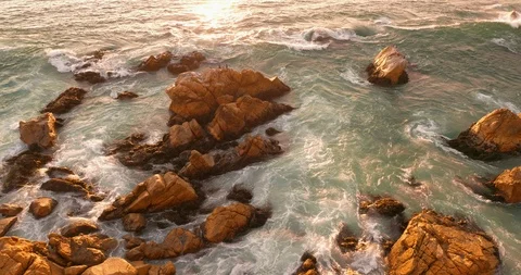 Waves and rocks with audio Stock Footage 111444381