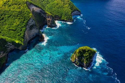 Waves and rocks as a background from top view. Blue water background from top Stock Photos