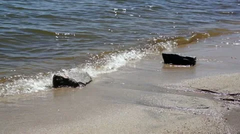 Waves and rocks close up Video stock 11849972