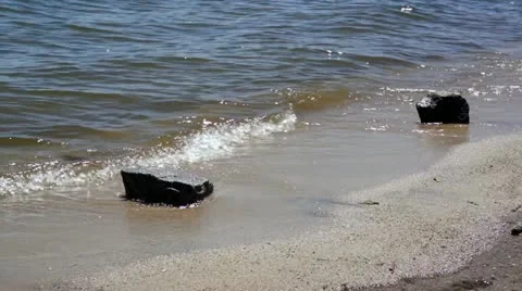 Waves and rocks close up Video stock 11849989