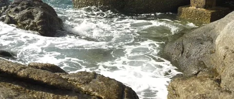 Waves and rocks on the coast Video stock 235112389
