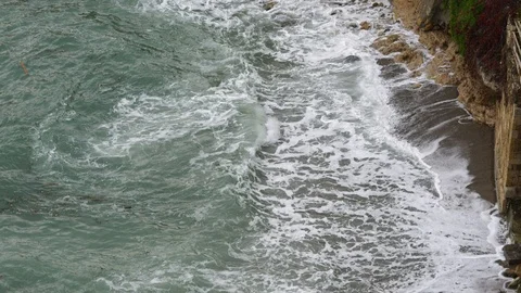 Waves and rocks Stock Footage 100538927