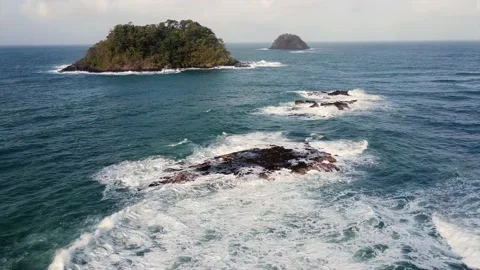 Waves and rocks in the ocean Video stock 166487128