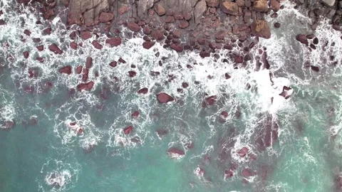 Waves and rocks top view Stock Footage 295911538