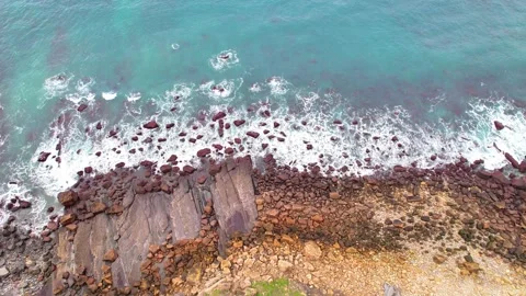 Waves and rocks top view Stock Footage 295911617