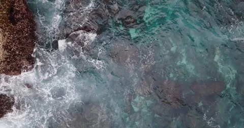 Waves and rocks, water flowing into the water Stock Footage 254636775