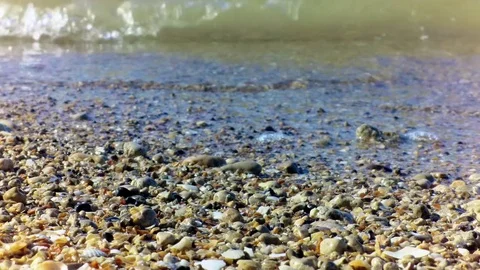The waves and the sand on the beach close up Stock Footage 79845909