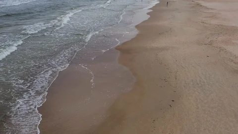 The waves and the sand on the beach close up Stock Footage 116493177