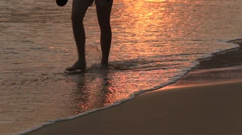 Waves and sand on the beach during sunset, close up. Stock Footage 47697341