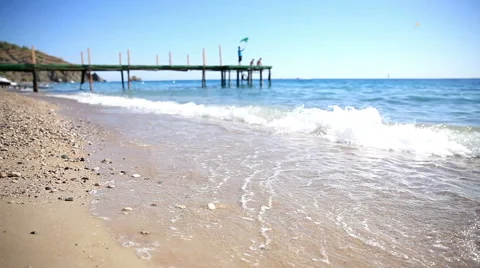 Waves and the sand on the beach Stock Footage 42523441