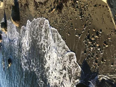 Waves and Sand Stock Photos