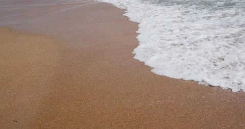 Waves and sandy beach Stock Footage 133721920
