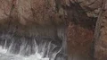 Waves and sea breeze close up at rocky coastline cliffs of Portugal 4k or 4k+ Resolution