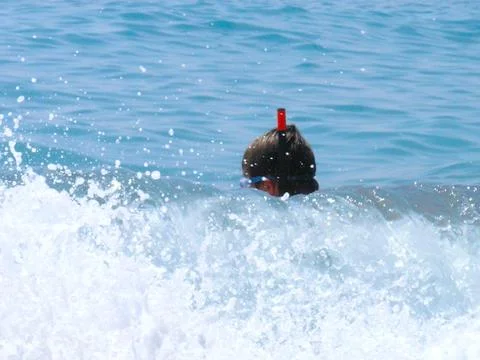 Waves and snorkel 写真素材