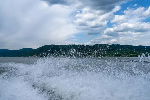 Waves and splashes of water behind the boat, danube, Romania, Danube boilers Stock Photos