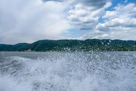 Waves and splashes of water behind the boat, danube, Romania, Danube boilers Stock Photos