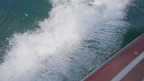 Waves and spray from the boat, close-up Stock Footage 223346400