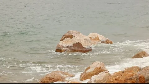 Waves and the stone on the dead sea, close up view Stock Footage 2797004