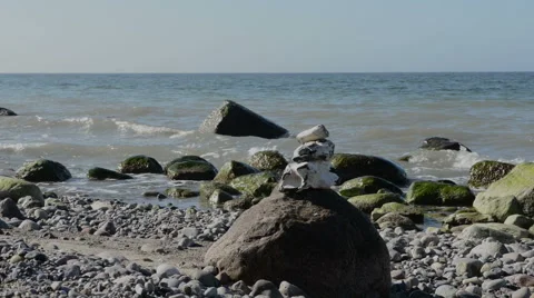 Waves and stones on beach Video stock 40783320