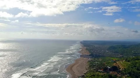 Waves and stretch of sand beach Stock Footage 225680253