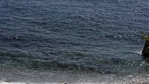 Waves and sunlight Video stock 104080428