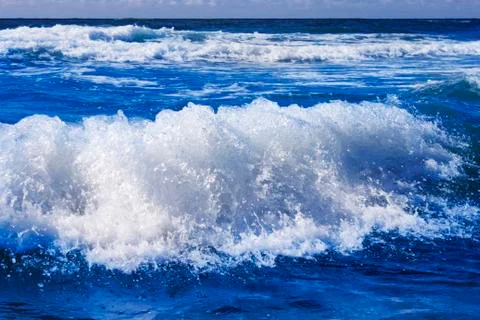 Waves and surf at beach Foto stock