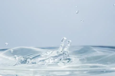 Waves and water drops Stock Photos