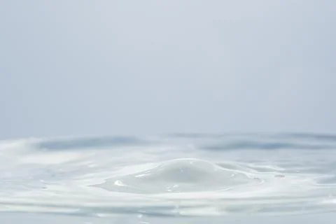 Waves and water drops Stock Photos