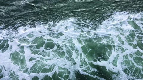 Waves and white foam spray created by powerful ferry boat moving across the sea. Stock Footage 172050978