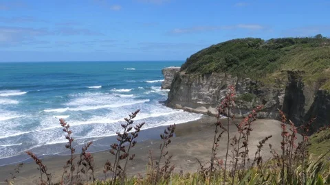 Waves and wind near a cliff in New Zealand 4K Stock Footage 107347422