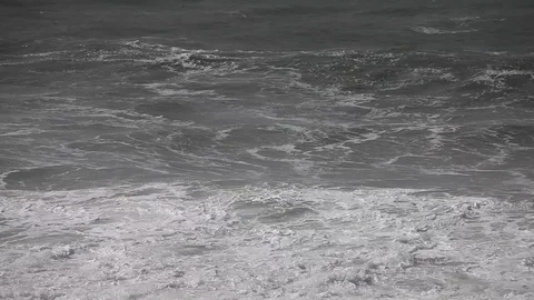 The waves ant tide on the rocky beach of Pacific ocean Video stock 90488365