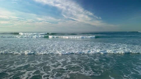 Waves Approaching On The Shore With Blue Sky Stock Footage 227305535