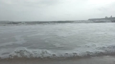 WAVES APPROACHING TOWARDS THE MARINE BEACH OF MUMBAI Stock Footage 135004760