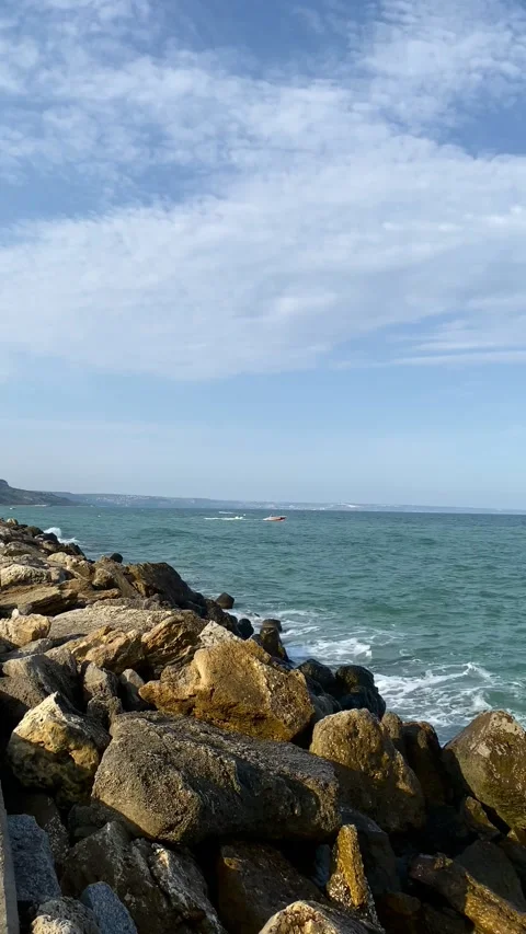 The waves are beating against the rocks on the seashore. Golden Sands, Bulgaria. 動画素材 343343064