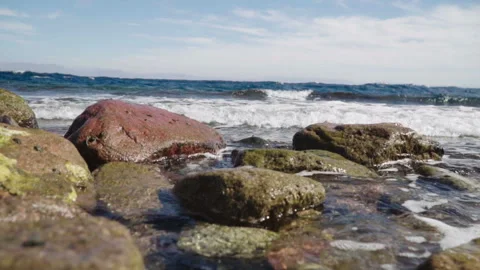 Waves are beating against a stone Stock Footage 86332982