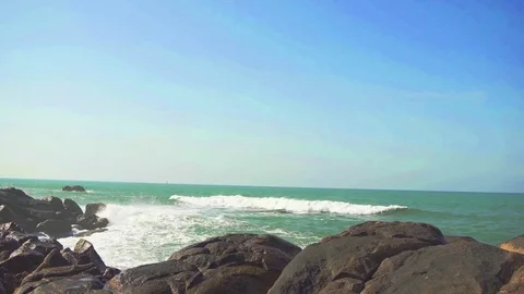 Waves are breaking on a cliff Stock Footage 75855223