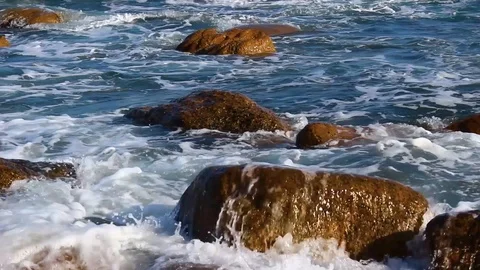 Waves are breaking on stones Video stock 126421090