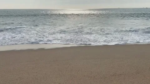 Waves are coming in slowmotion at the beach in Vila Nova de Gaia Stock Footage 245344190