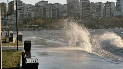 Waves are crushing on the coastline during sunset Stock Footage 166307754