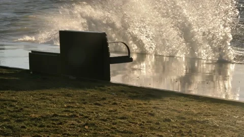 Waves are crushing on the coastline during sunset Stock Footage 166307849