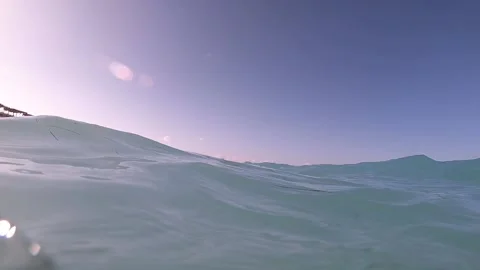 Waves are forming and moving forward the shore of a paradisiac island with Vídeo Stock 150755158